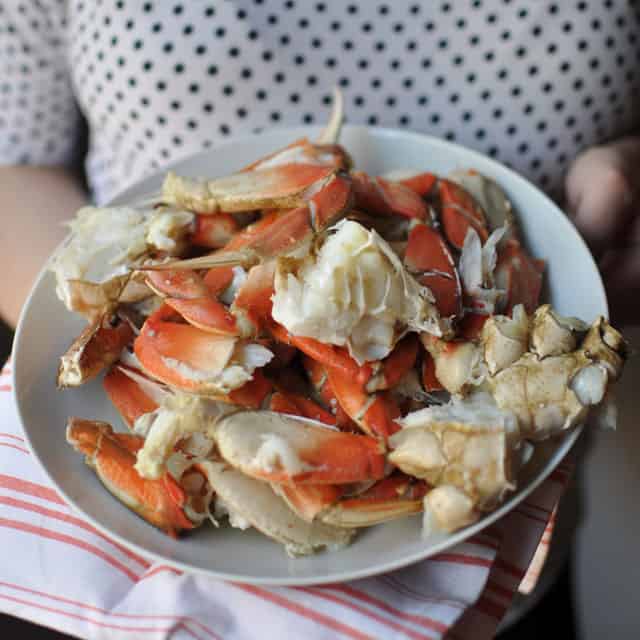 We've prepared the definitive, step-by-step guide to cooking and cleaning crab at home. All you'll need is a pot, some tongs, and a little bit of courage. Plus get the recipe for 2 delicious dipping butters: Lemon-Garlic Butter and Harissa Butter